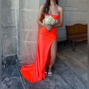 Neon orange strapless size 2  prom dress